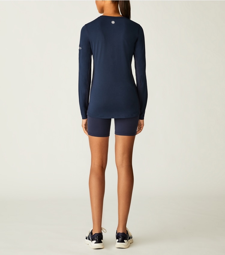 Tory Sport designer tops Cooling Performance Graphic-T Long-Sleeve Top in Tory Navy on model back