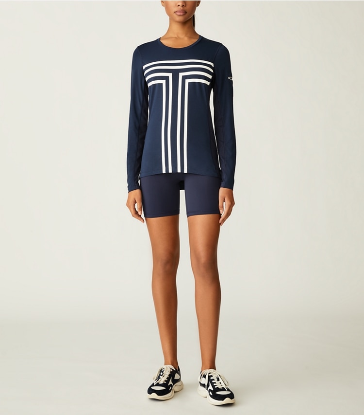 Tory Sport designer tops Cooling Performance Graphic-T Long-Sleeve Top in Tory Navy on model front