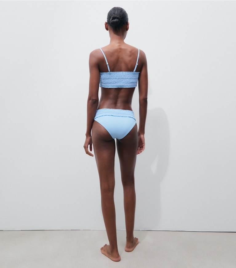 Tory Burch designer two pieces Costa Smocked Bikini Bottom in Washed Sky / White on model back