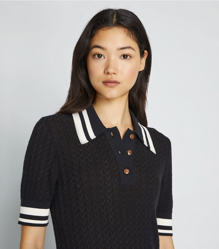Tory Sport designer セーター コットン ポインテール ポロシャツ in Black / New Ivory on model detail