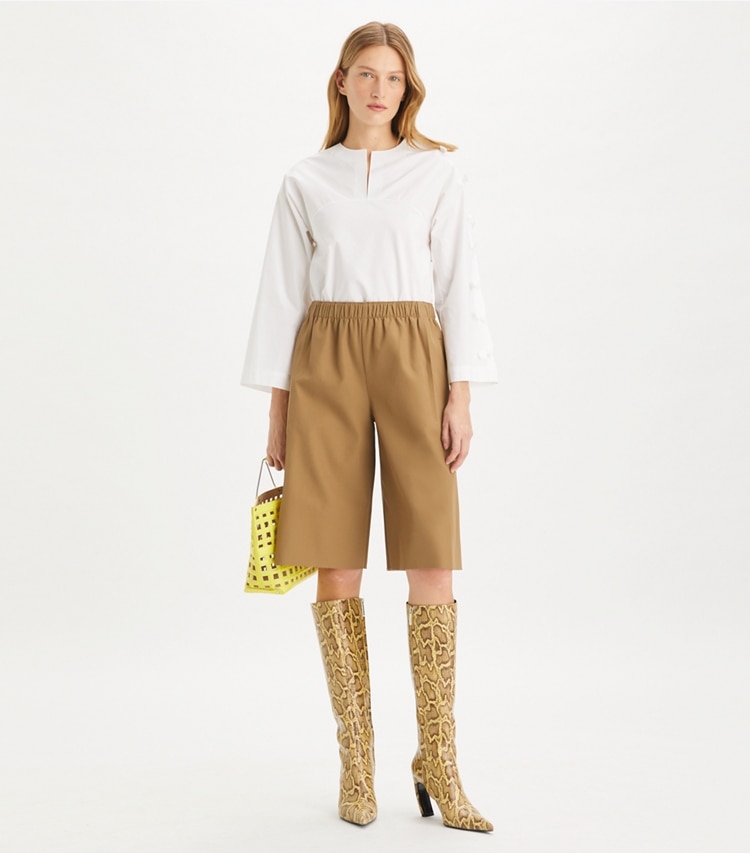 Tory Burch designer tops Cotton Poplin Knot Tunic in White on model front