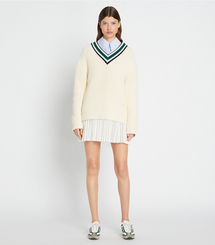 Tory Sport designer sweaters Cotton Ribbed Chevron V-Neck Sweater in NEW IVORY / Evergreen on model front