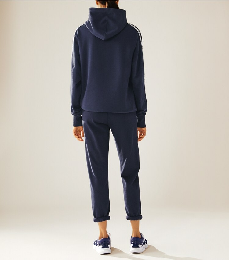 Tory Sport designer bottoms Cotton Terry Sweatpants in Tory Navy on model back