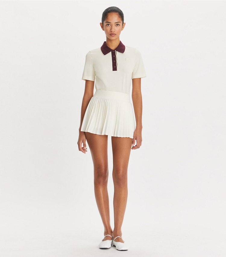 Tory Sport designer tops Cotton Vintage Collar Polo in NEW IVORY / VIVID FIG on model front