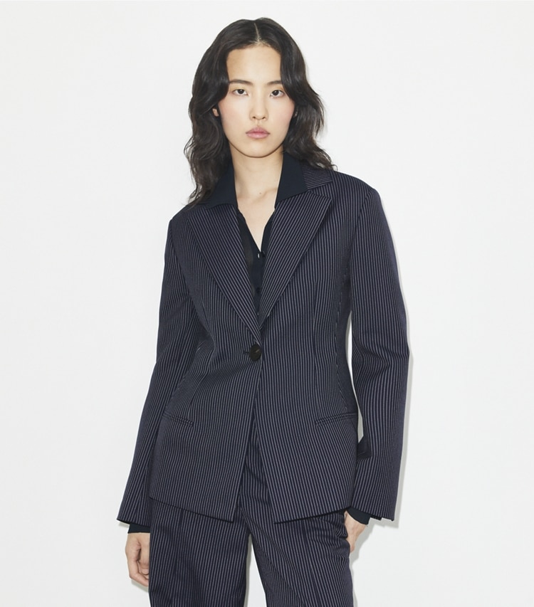 Tory Burch designer jackets Crepe Blazer in Tory Navy/White Pinstripe Wool Suiting on model detail
