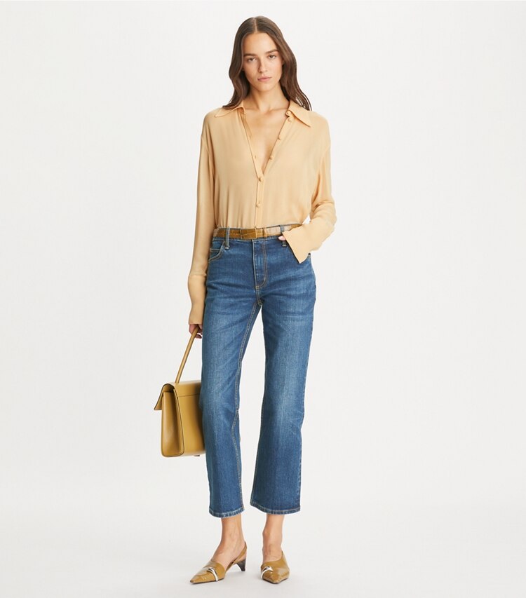 Tory Burch designer bottoms Cropped Flared Jeans in Dark Vintage Wash on model front
