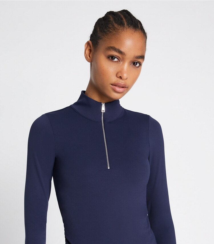 Tory Sport designer tops Cropped Half-Zip Long-Sleeve Top in Tory Navy on model detail