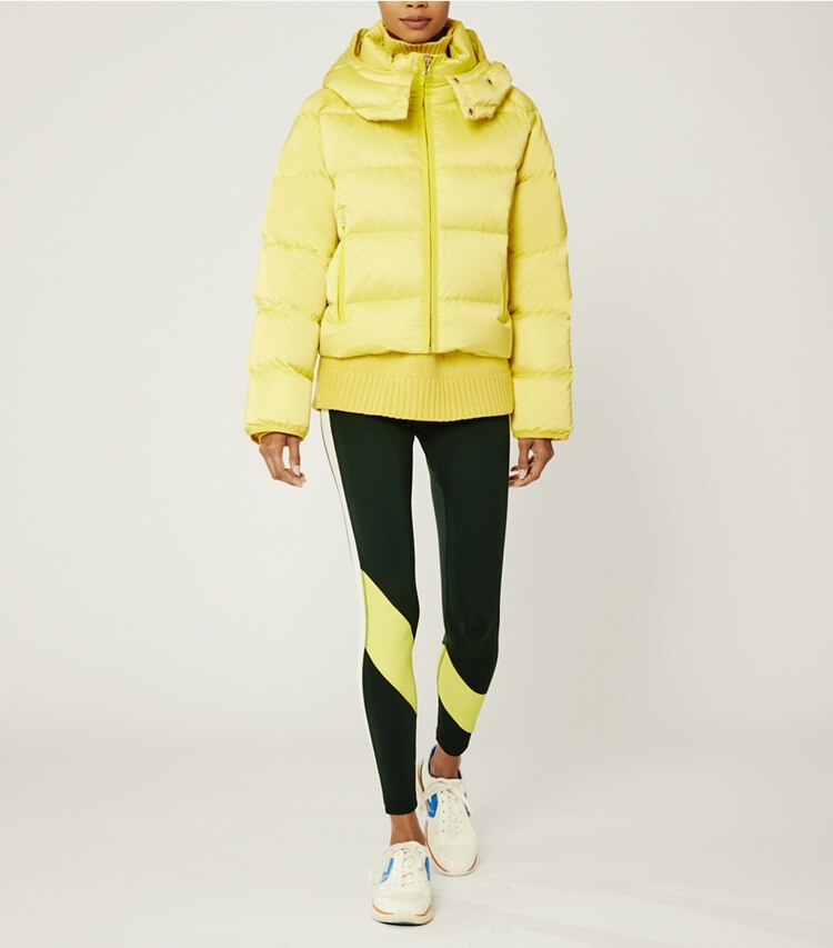 Tory Burch designer coats Cropped Performance Satin Down Jacket in Citrea on model front