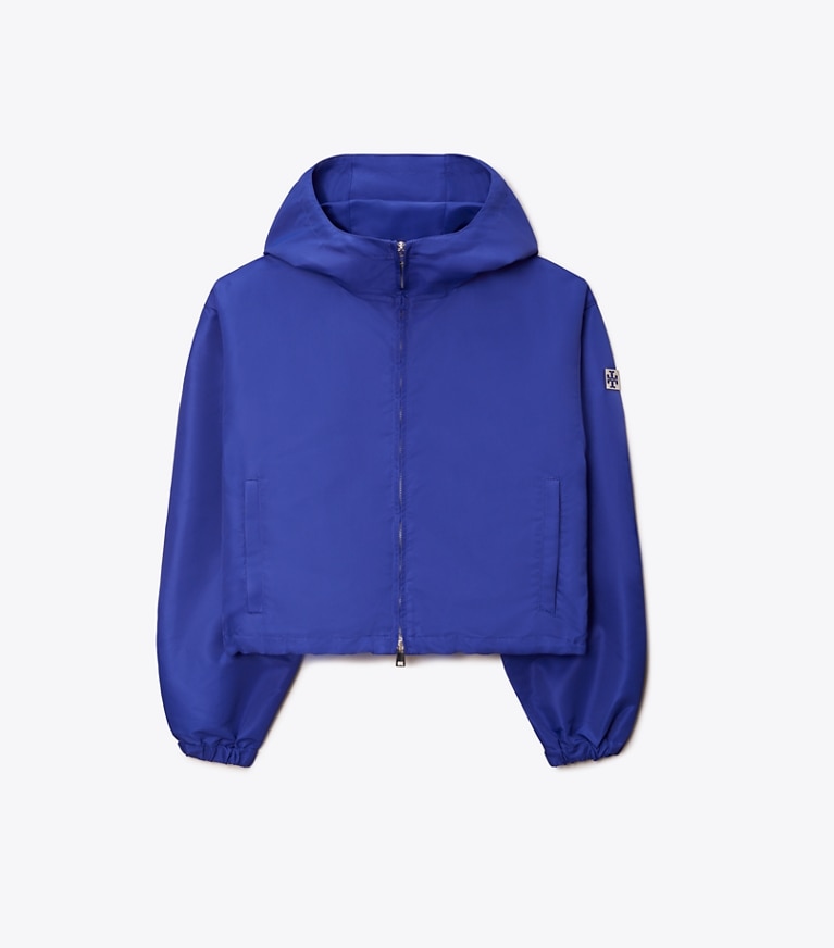https://s7.toryburch.com/is/image/ToryBurch/style/cropped-windbreaker-front.TB_146158_060_SLFRO.pdp-767x872.jpg