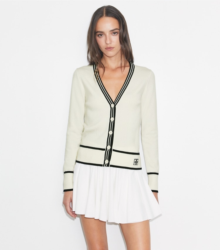 Tory Burch designer sweaters Cropped Wool Cardigan in White / Deep Navy on model detail