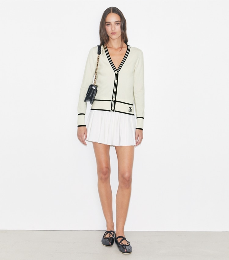 Tory Burch designer sweaters Cropped Wool Cardigan in White / Deep Navy on model front