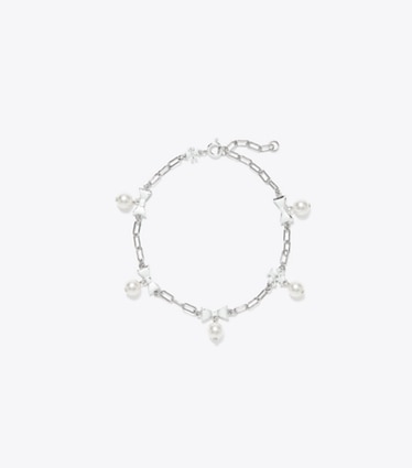 Tory Burch designer ブレスレット キュリオシティ ボウ ブレスレット in Tory Silver / Pearl front
