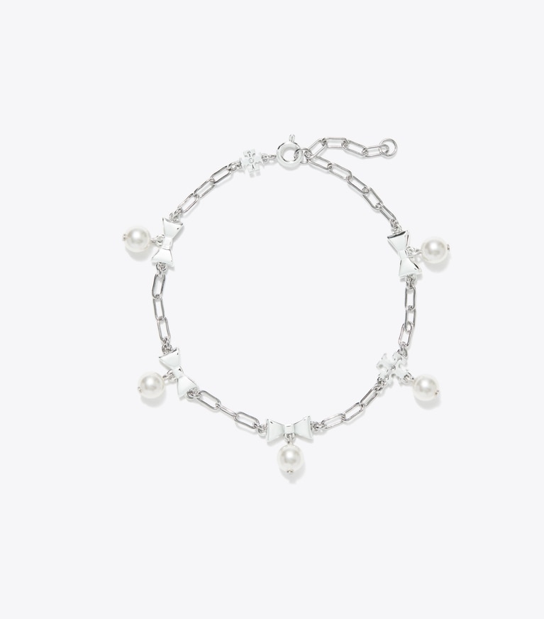 Tory Burch designer ブレスレット キュリオシティ ボウ ブレスレット in Tory Silver / Pearl front