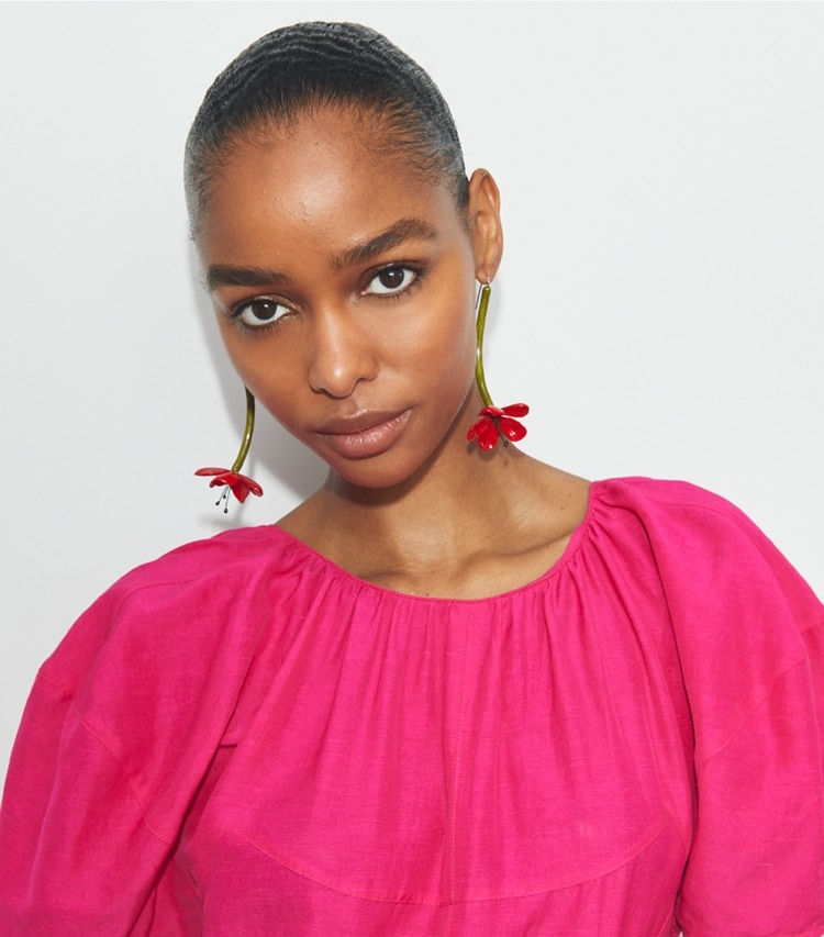 Tory Burch designer earrings Curiosity Flower Earrings in Red accessory on model