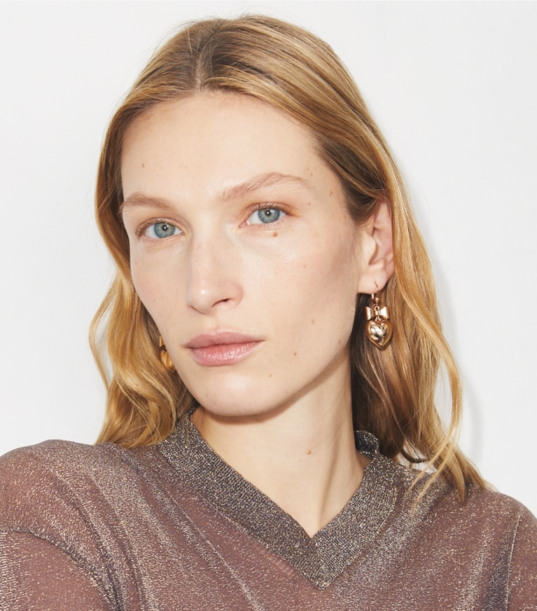 Tory Burch designer earrings Curiosity Heart and Bow Earrings in Tory Gold front