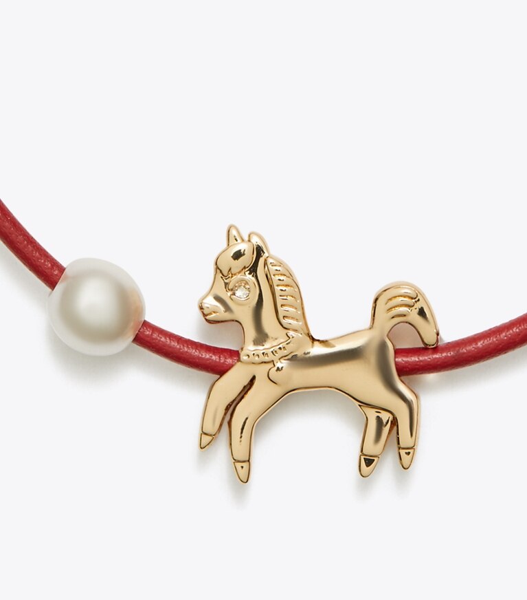 Tory Burch designer armbänder Curiosity Horse Armband mit Schiebeverschluss in Red front
