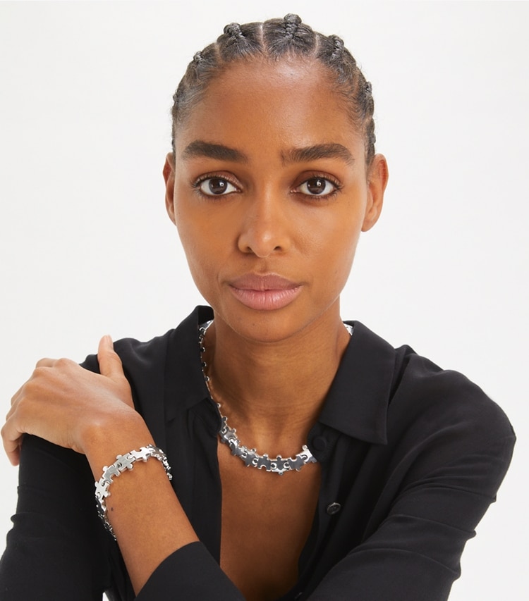 Tory Burch designer necklaces Curiosity Puzzle Piece Collar in Light Silver accessory on model