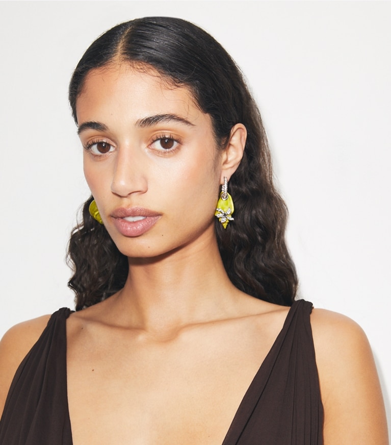 Tory Burch designer earrings Curiosity Shell Hoop Earrings in Purple accessory on model