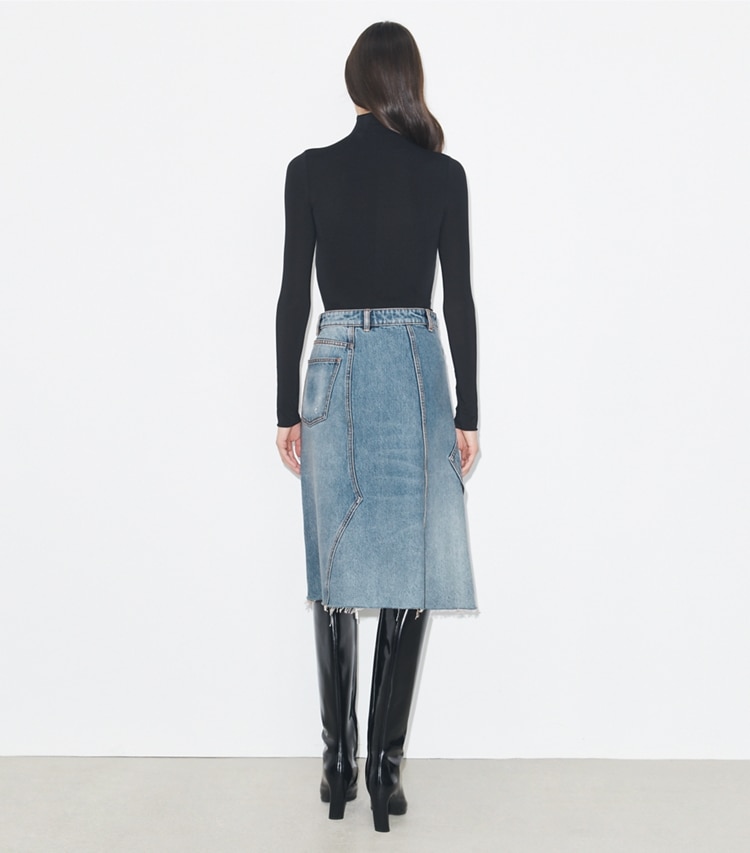 Tory Burch designer bottoms Deconstructed Denim Skirt in Worn Vintage Wash on model back