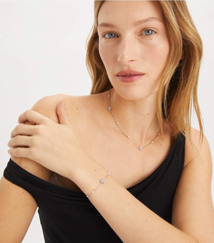 Tory Burch designer bracelets Delicate Kira Pearl Bracelet in Tory Silver / Crystal / Pearl accessory on model