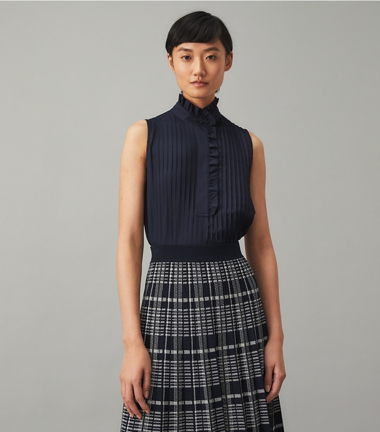 Tory Burch designer tops Deneuve Shell in Tory Navy on model detail