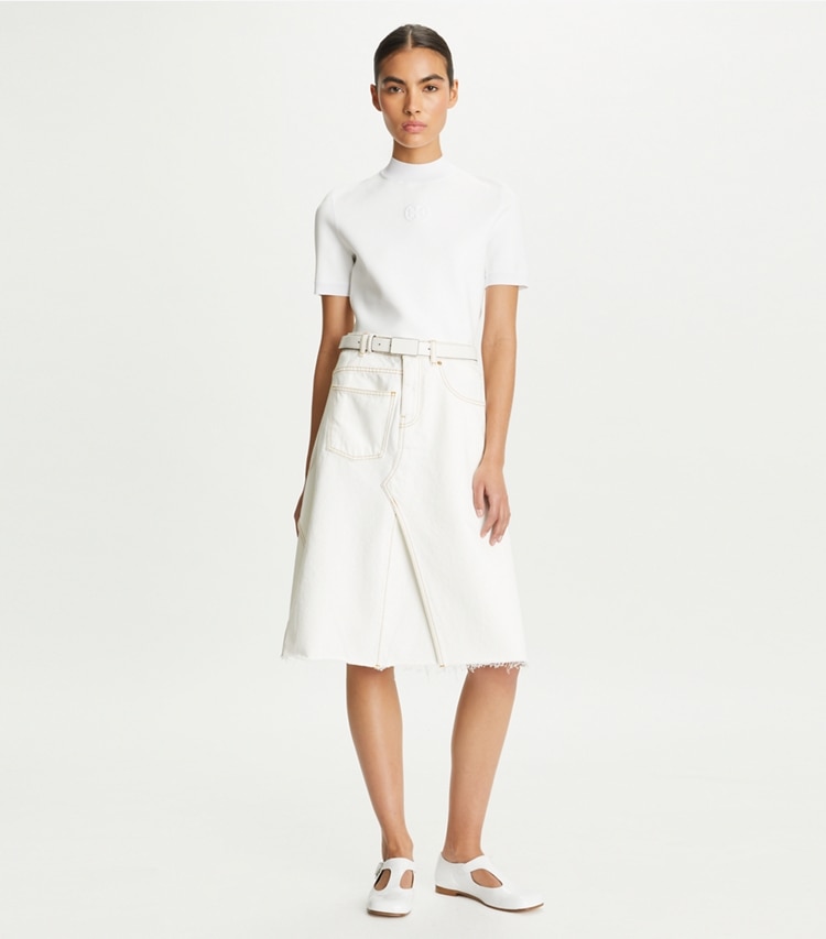 Tory Burch designer bottoms Denim Deconstructed Skirt in White Chalk Wash on model front