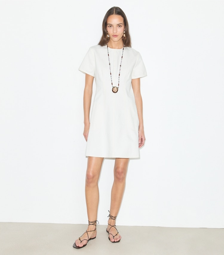 Tory Burch designer dresses Denim Mini Dress in White on model front