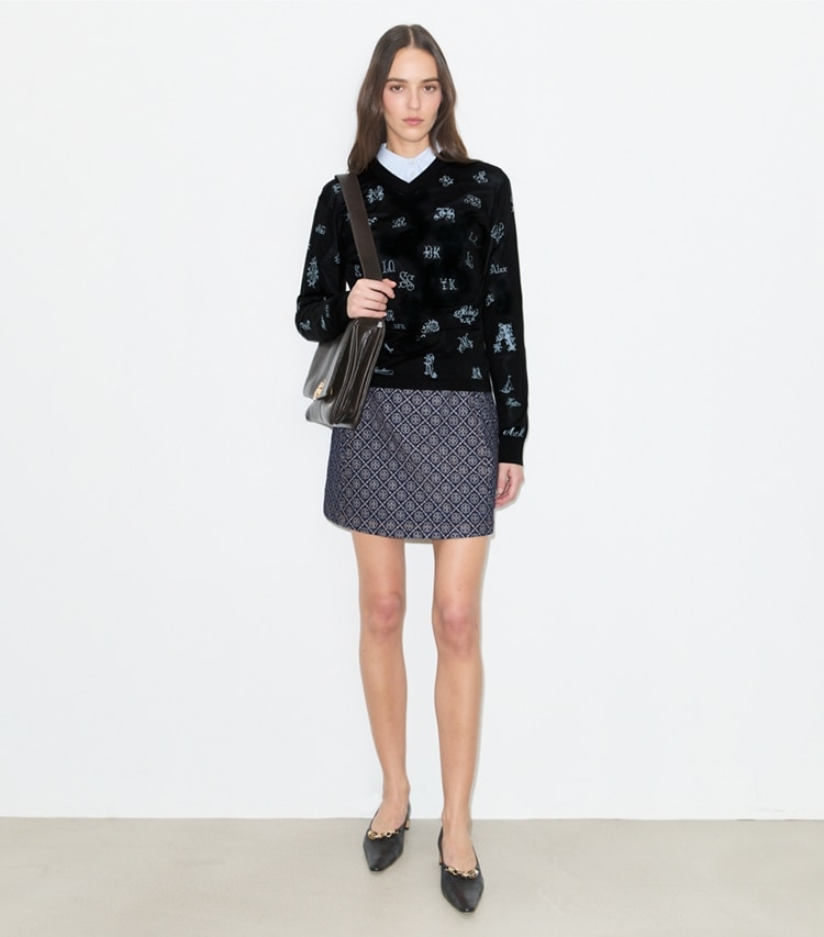 Tory Burch designer bottoms Denim Mini Skirt in T-Monogram Stone Wash on model front