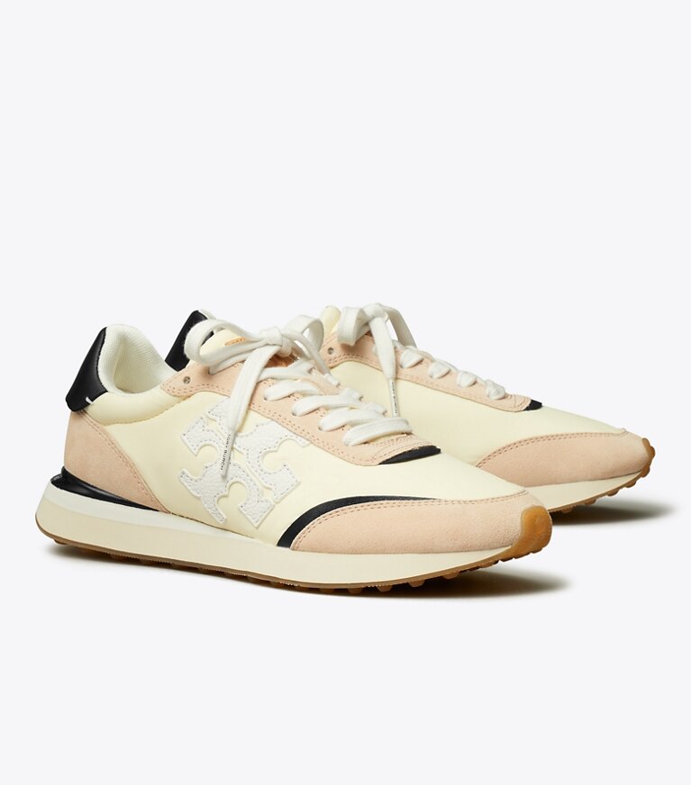 Tory Burch designer sneakers Destiny Sneaker in NEW CREAM / WHITE / ROSE PINK angle