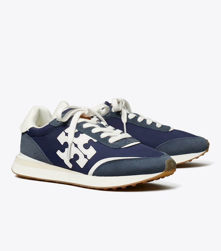 Tory Burch designer sneakers Destiny Trainer in RETRO NAVY/ RETRO NAVY/ WHITE angle