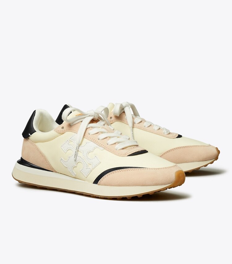 Tory Burch designer sneakers Destiny Trainer in NEW CREAM / WHITE / ROSE PINK angle