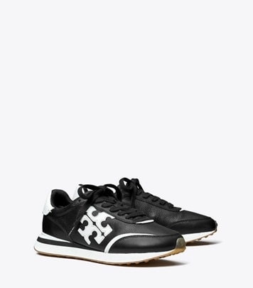 Tory Burch designer sneakers Destiny Trainer in PERFECT BLACK / WHITE angle