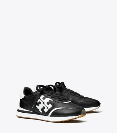 Tory Burch designer sneakers Destiny Trainer in PERFECT BLACK / WHITE angle