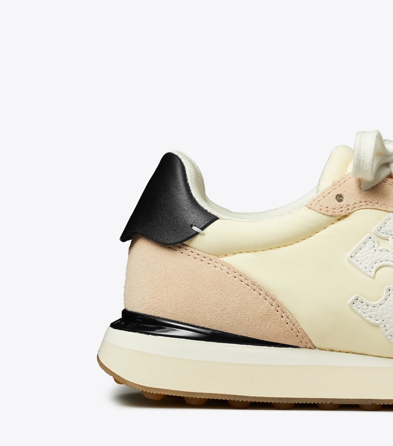 Tory Burch designer sneakers Destiny Trainer in NEW CREAM / WHITE / ROSE PINK angle