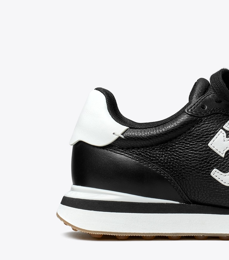 Tory Burch designer sneakers Destiny Trainer in PERFECT BLACK / WHITE angle