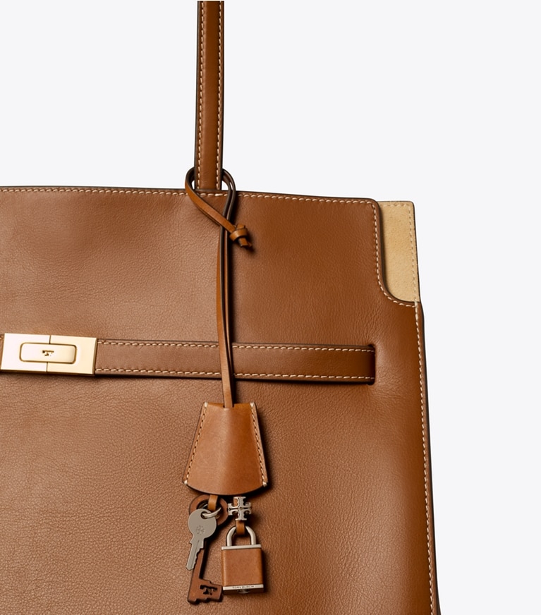 Tory Burch diseñador dijes para bolso y llaveros Dije para bolso con candado y llave en Classic Cuoio detalle