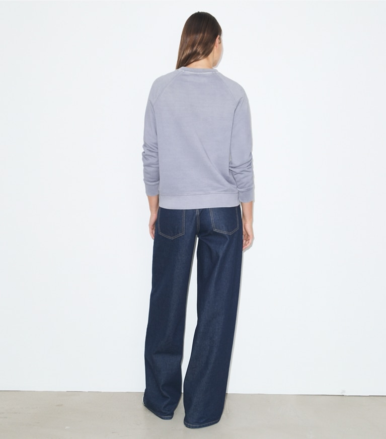 Tory Burch designer sweaters Distressed Cotton Sweatshirt in VAPOR BLUE on model back