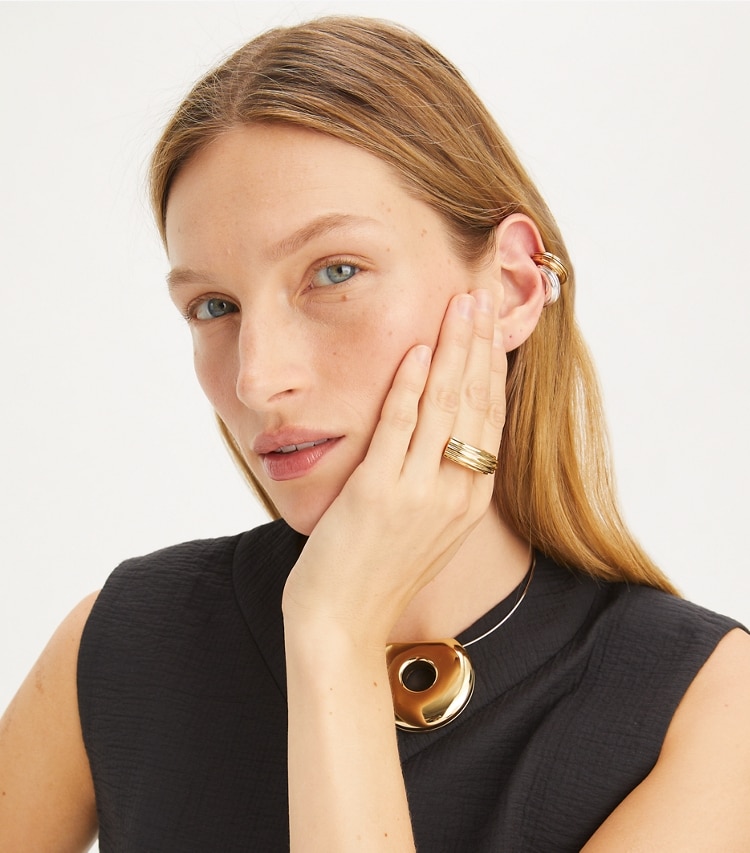 Tory Burch designer rings Donut Ring in Light Brass accessory on model