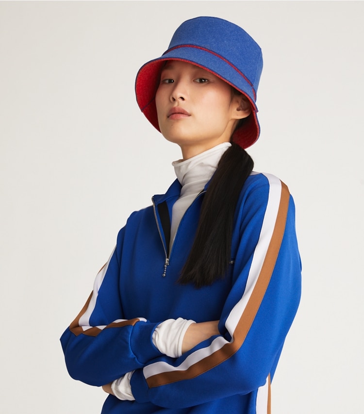 Tory Burch designer hats Double-Sided Felt Bucket Hat in Bright Indigo accessory on model