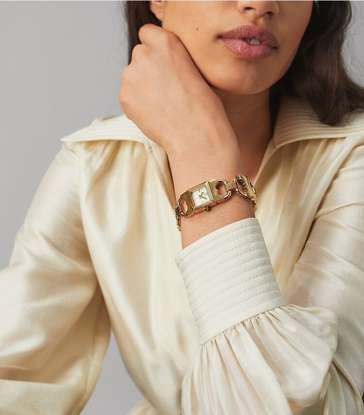 Tory Burch designer strap watches Double T Link Watch, Gold-Tone Stainless Steel/Navy in GOLD/NAVY accessory on model