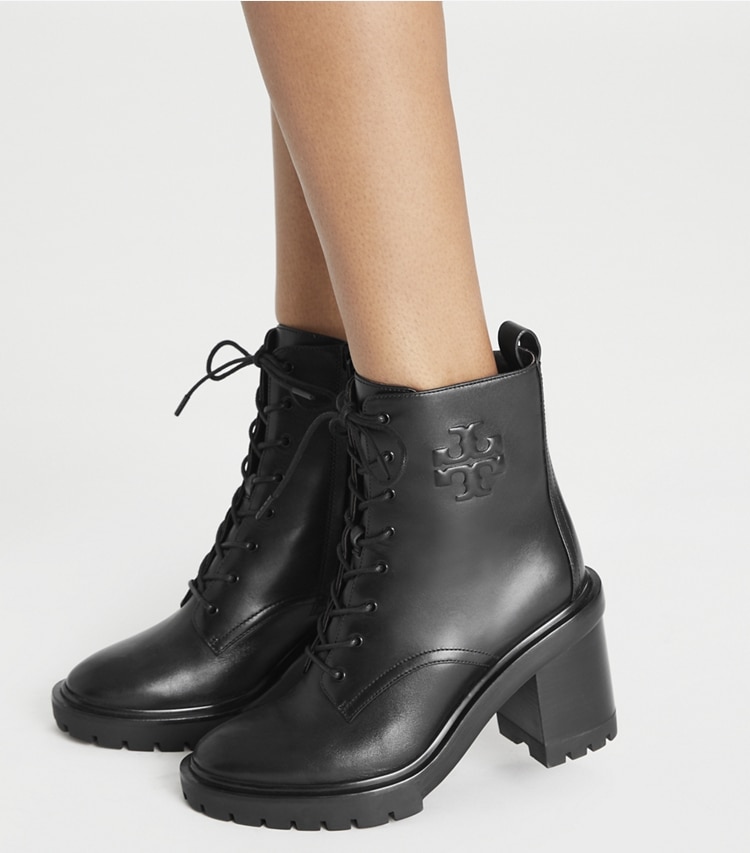 Tory Burch designer ankle boots Double T Lug Ankle Boot in PERFECT BLACK accessory on model