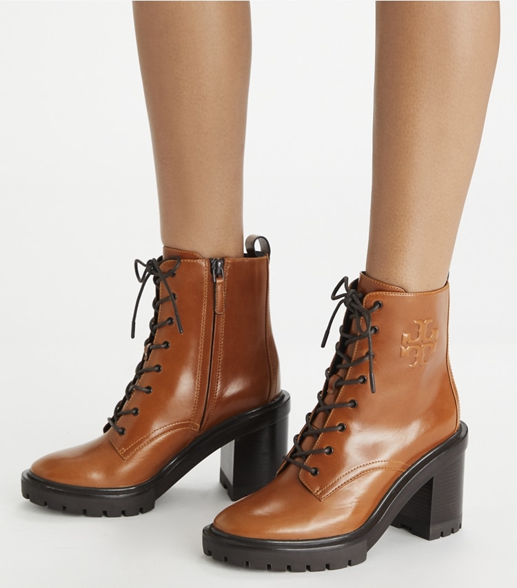 Tory Burch designer ankle boots Double T Lug Ankle Boot in SIERRA TAN accessory on model