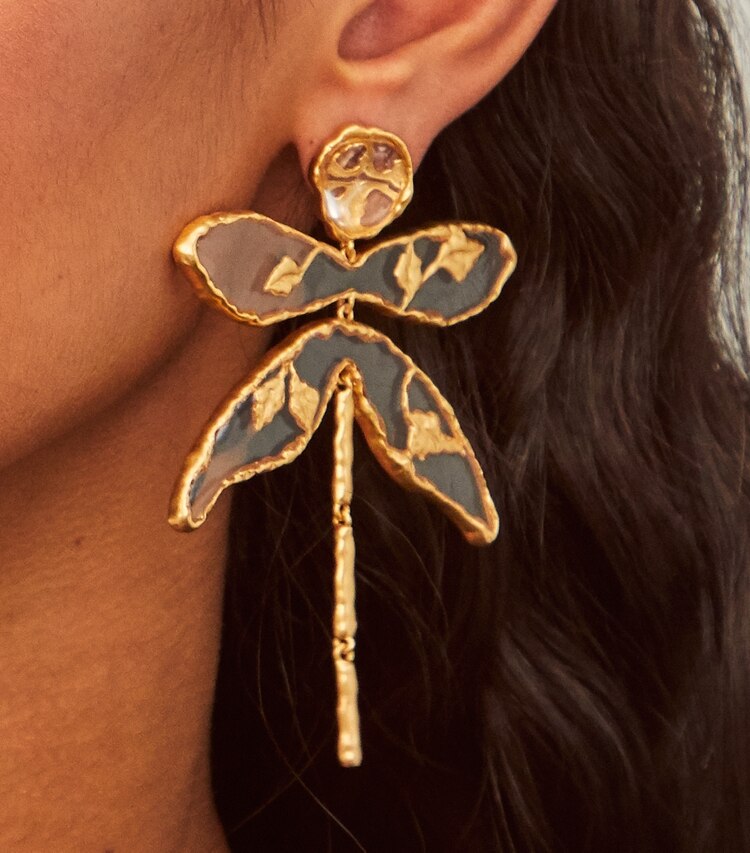Tory Burch designer earrings Dragonfly Earring in Rolled Brass/Clear accessory on model