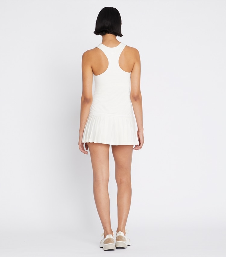 Tory Sport designer dresses Drop-Waist Tennis Dress in Snow White / Snow White on model back