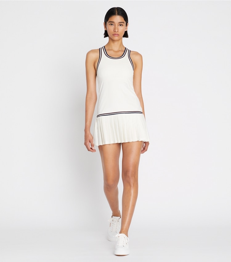 Tory Sport designer dresses Drop-Waist Tennis Dress in Snow White / Winetasting on model front