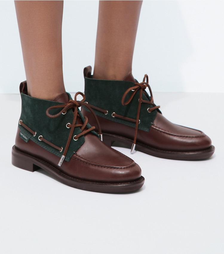 Tory Burch designer ankle boots Duck Ankle Boot in WARM TEAL / T MORO accessory on model