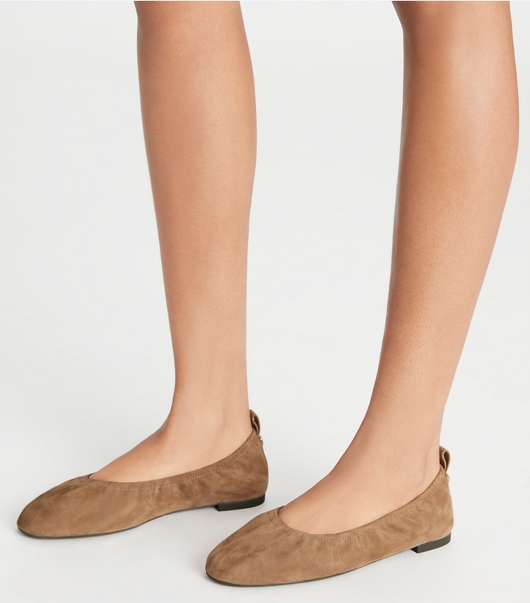 Tory Burch designer flats Eddie Ballet in RIVER ROCK accessory on model
