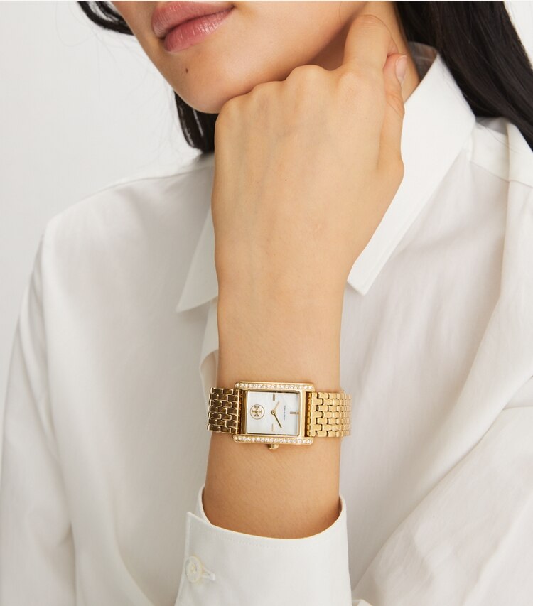 Tory Burch designer armbanduhren Eleanor Armbanduhr aus goldfarbenem Edelstahl in WHITE MOP/GOLD accessory on model