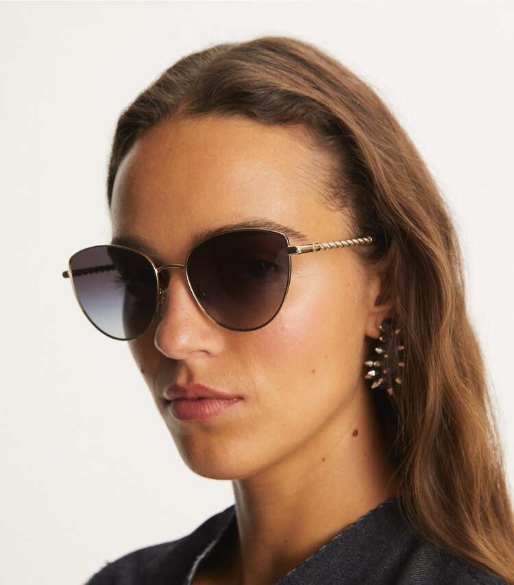 Tory Burch designer sunglasses & eyewear Eleanor Chain Cat Eye in SHINY LIGHT GOLD/ SOLID BORDEAUX accessory on model