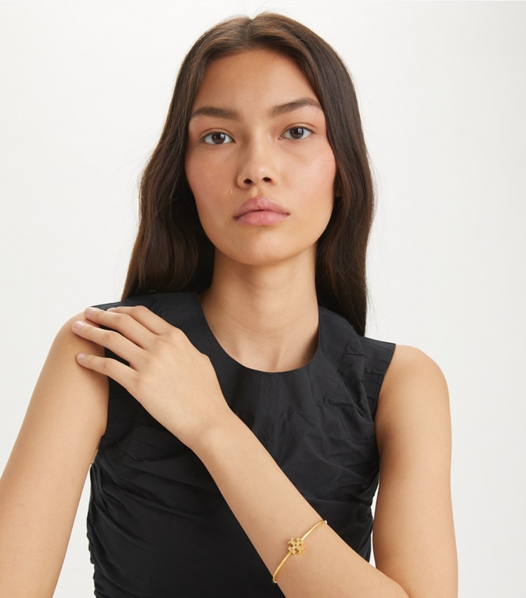 Tory Burch designer bracelets Eleanor Hinged Cuff in Tory Gold accessory on model
